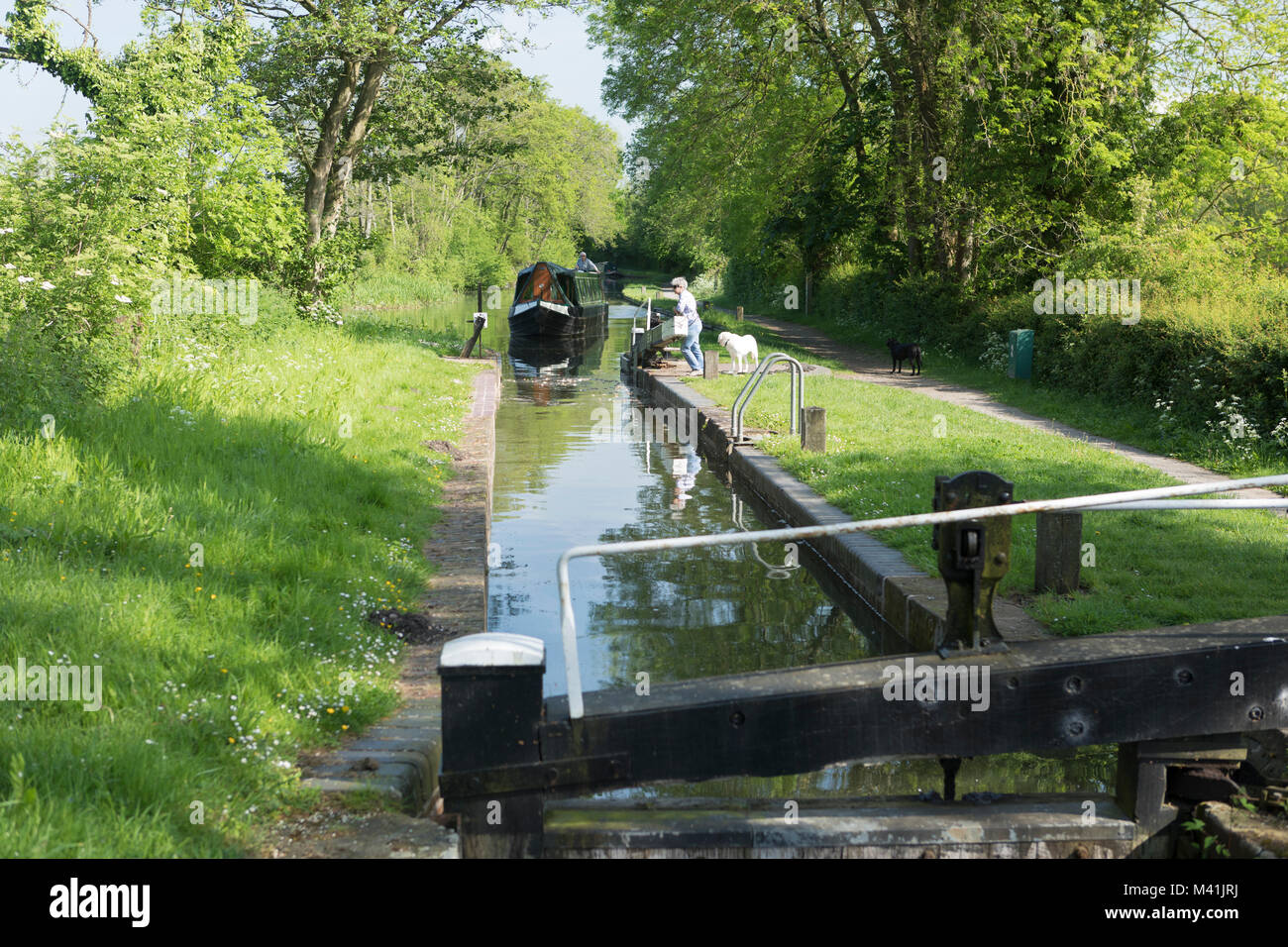Boat entering Lock on the North Stratford Canal. Stock Photo
