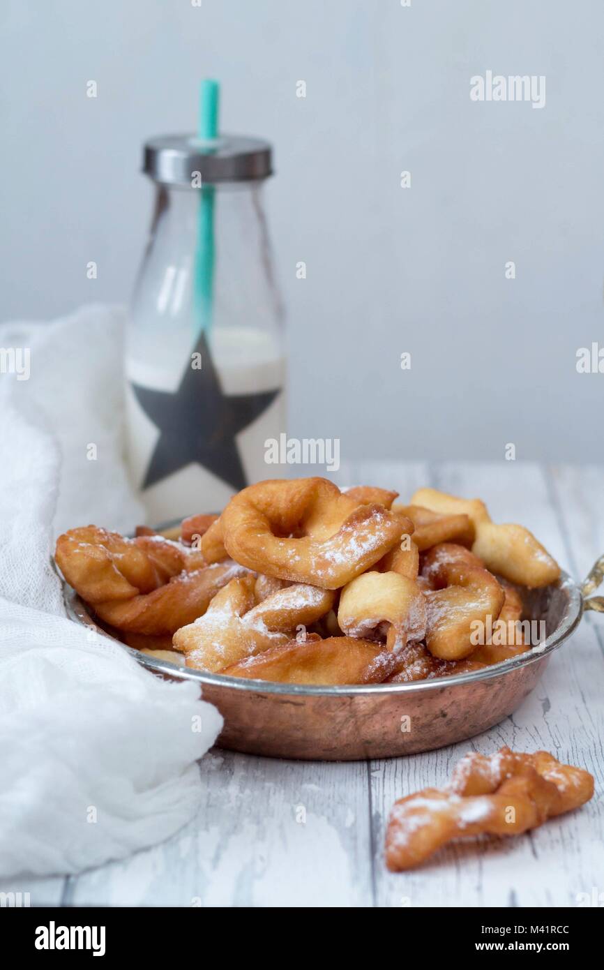 traditional polish sweets called faworki or angel wings for  fat Thursday - end of carnival Stock Photo
