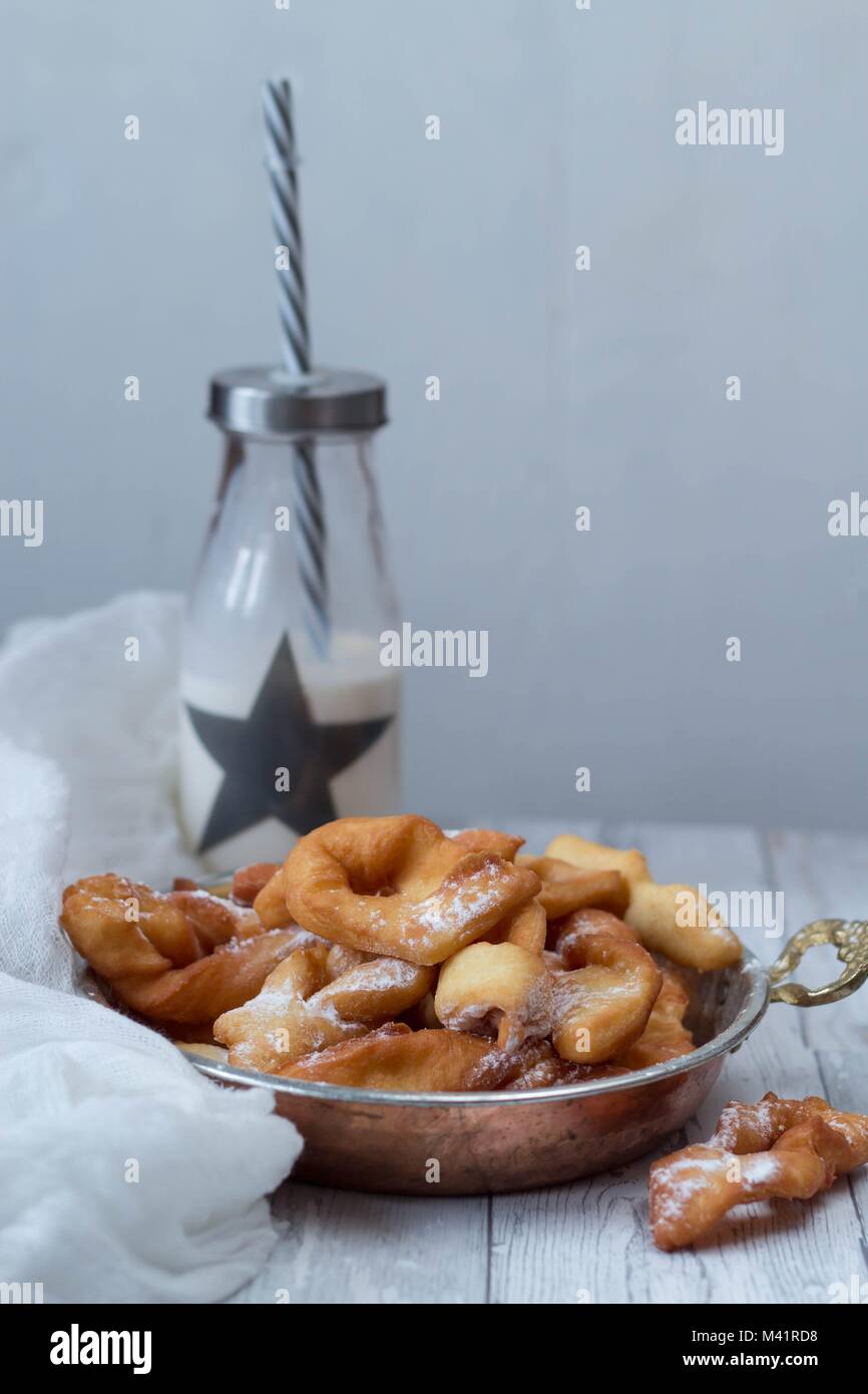 traditional polish sweets called faworki or angel wings for  fat Thursday - end of carnival Stock Photo