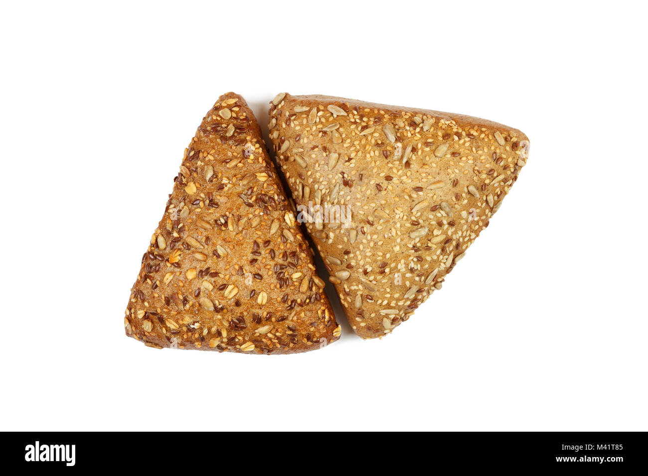 Closeup of two rye bread with flax seeds isolated on white background ...