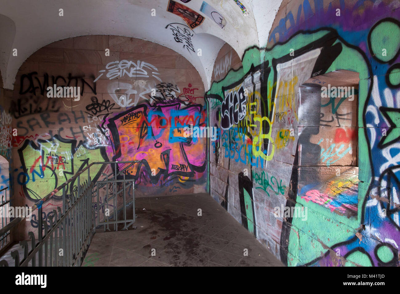 Europe, Germany, Cologne, graffiti in a stairwell to the Suedbruecke, railroad bridge across the river Rhine.  Europa, Deutschland, Koeln, Graffiti im Stock Photo