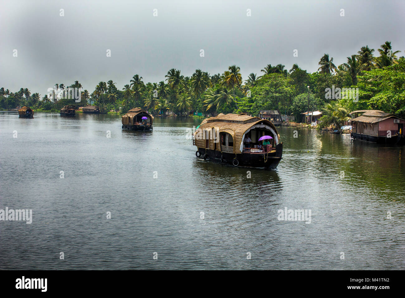 Series of house boats in Kerala backwaters Stock Photo