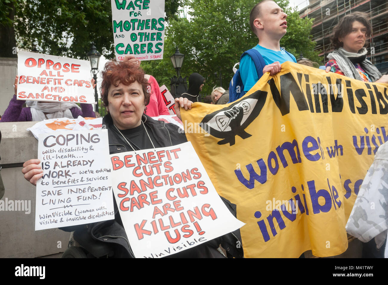 Claire Glasman of WinVisible (women with visible and invisible disabilities), at 'Balls Against the Budget' protest at Downing St against budget cuts that hit the disabled hardest. Stock Photo