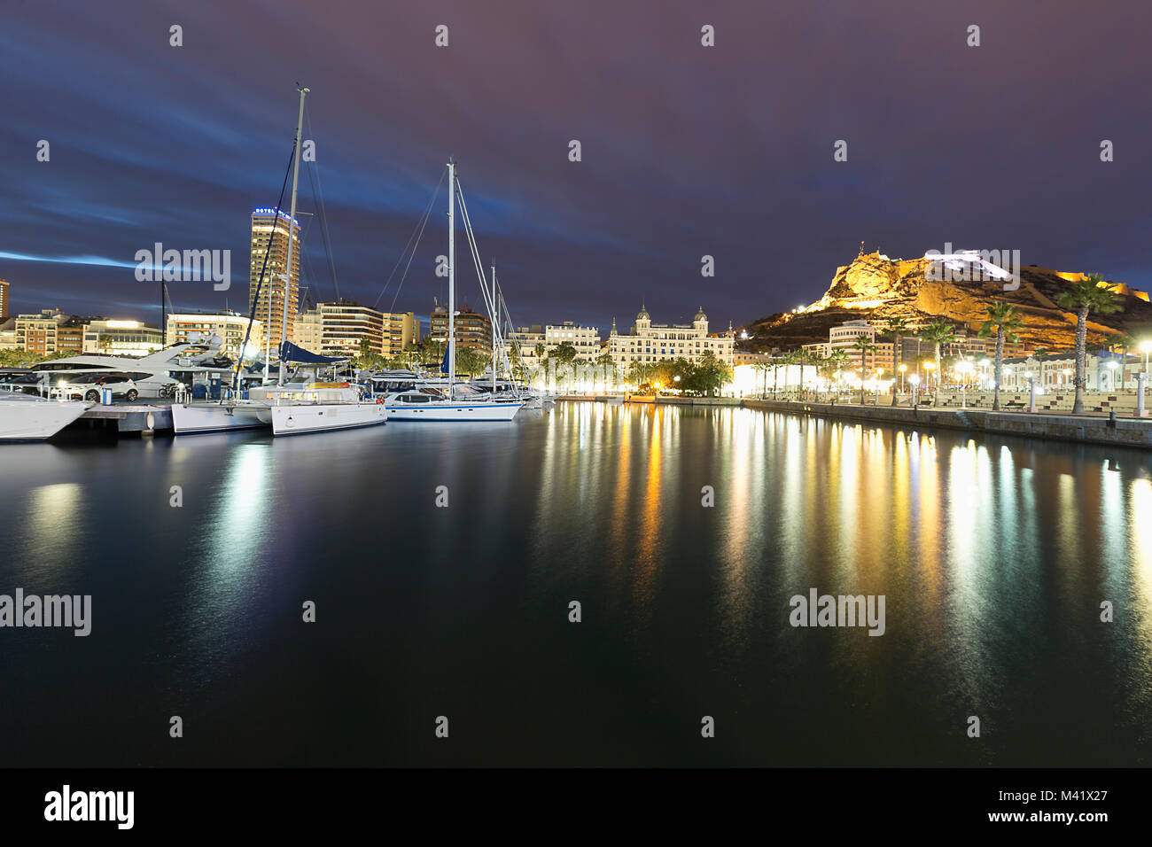 Alicante, Spain. February 9, 2018: Views of the Port of Alicante and the city during a cold winter sunset. Stock Photo