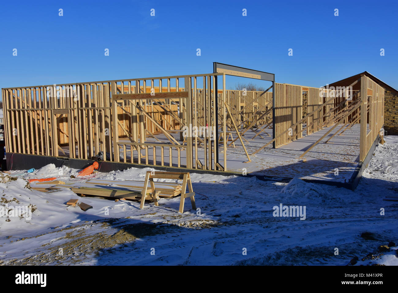 Concrete and wood frame commercial building under construction. Stock Photo