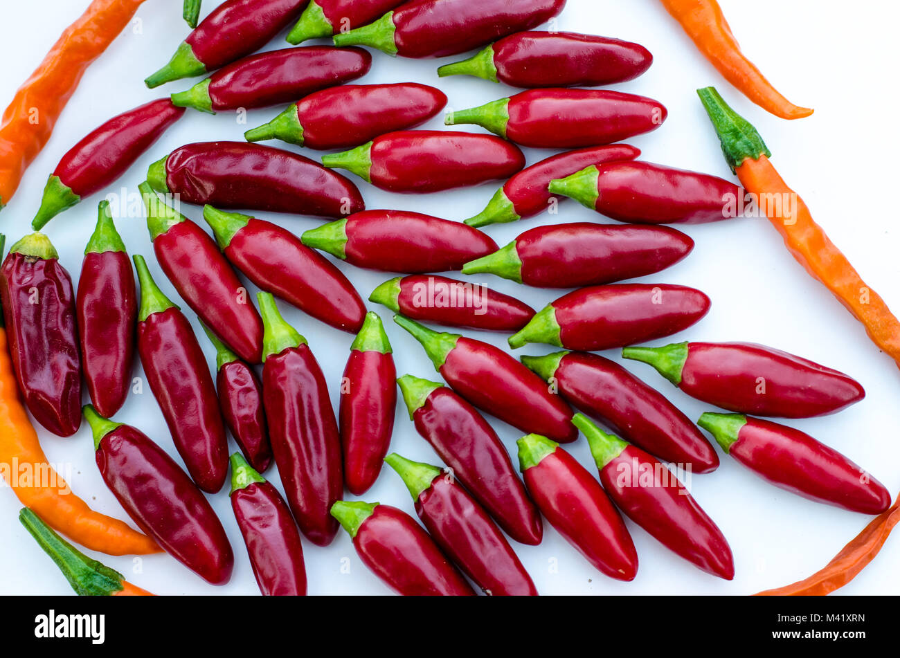 red spicy chilli vegetable arrangement isolated Stock Photo
