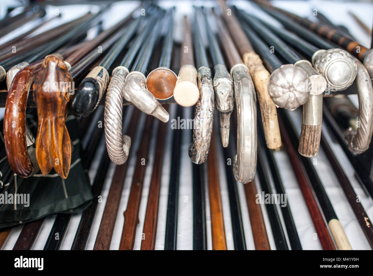 Lots of walking sticks arranged together on a stall at a market in Buenos Aires, Argentina Stock Photo