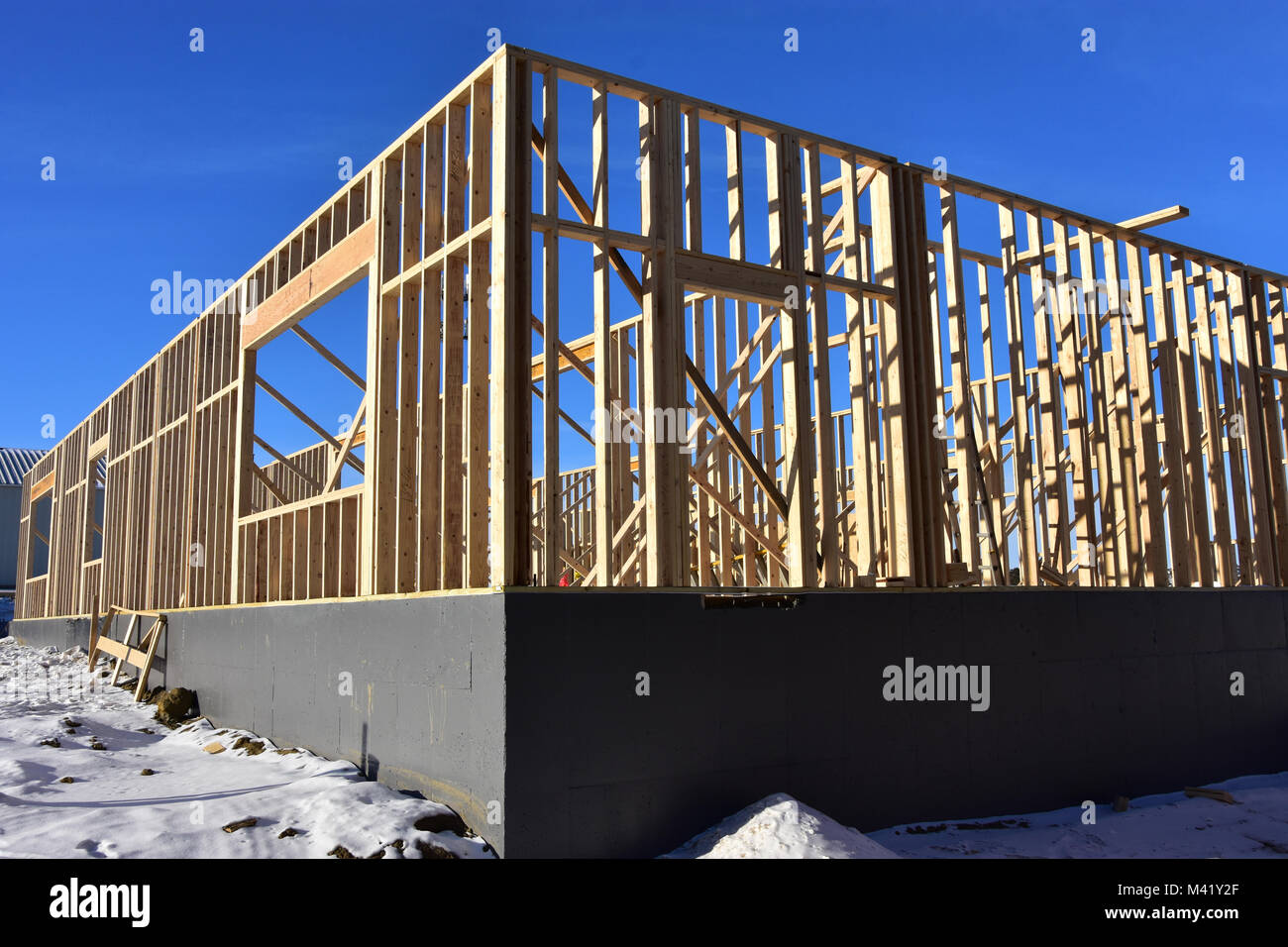 Concrete and wood frame commercial building under construction Stock ...