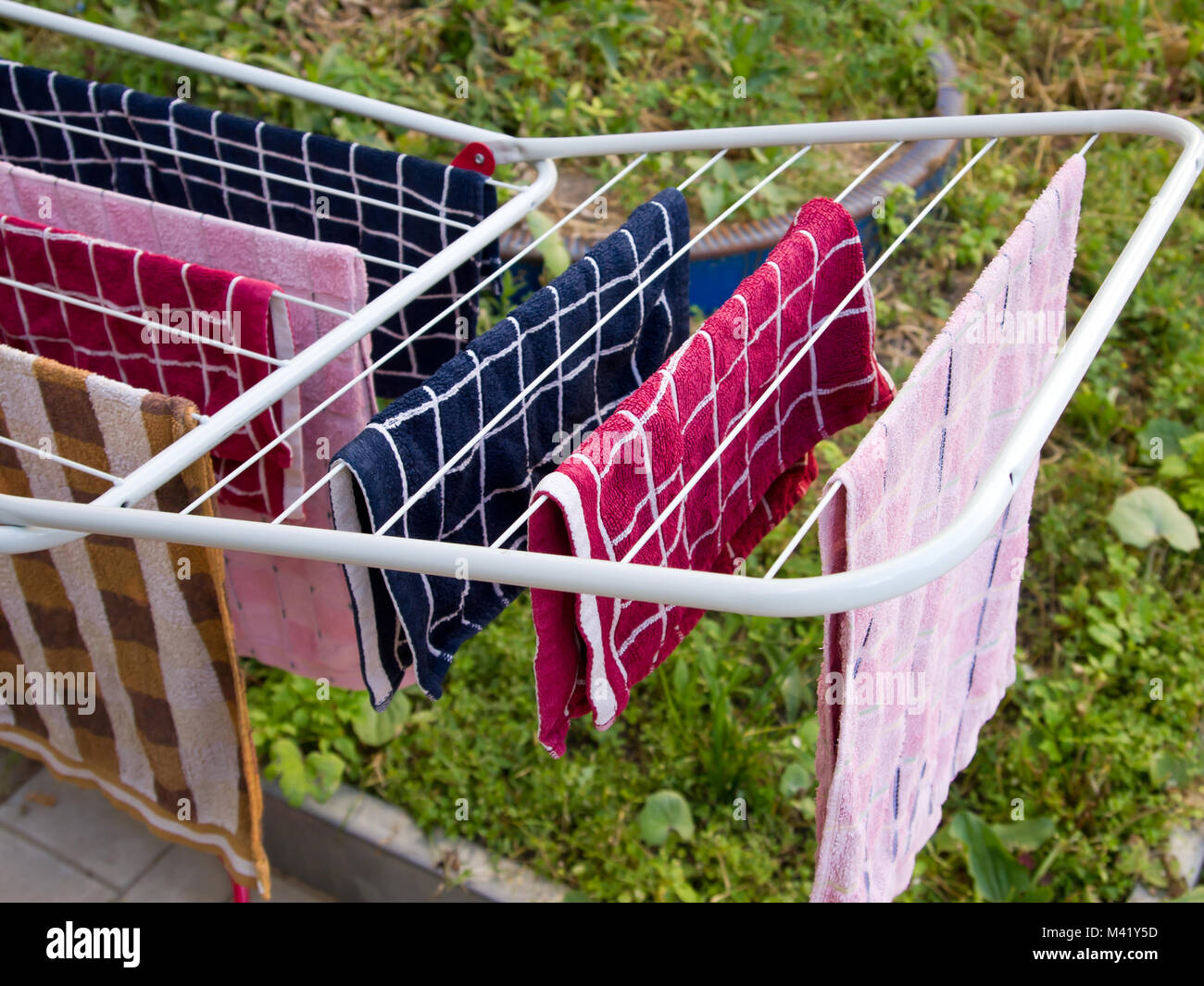 Clean towels in the dryer to dry laundry Stock Photo Alamy