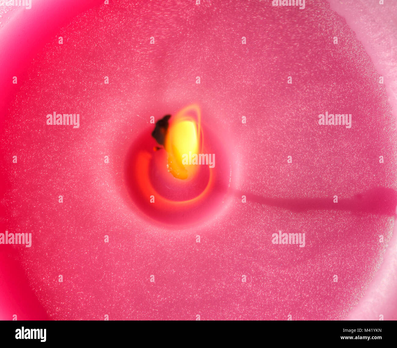 pink colored candle with candle Flame Stock Photo Alamy