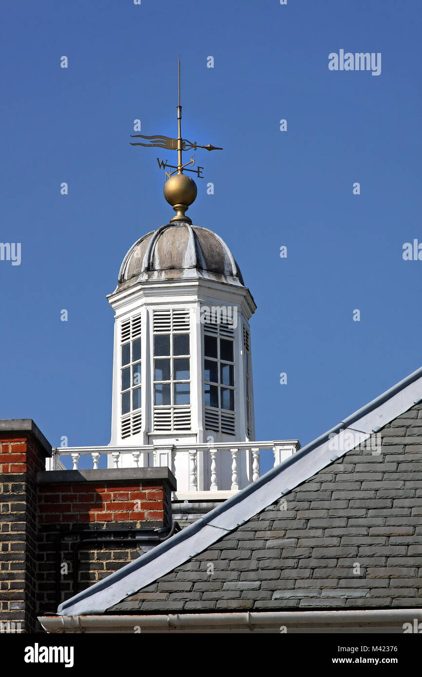 Wind direction indicator on top of roof Stock Photo Alamy