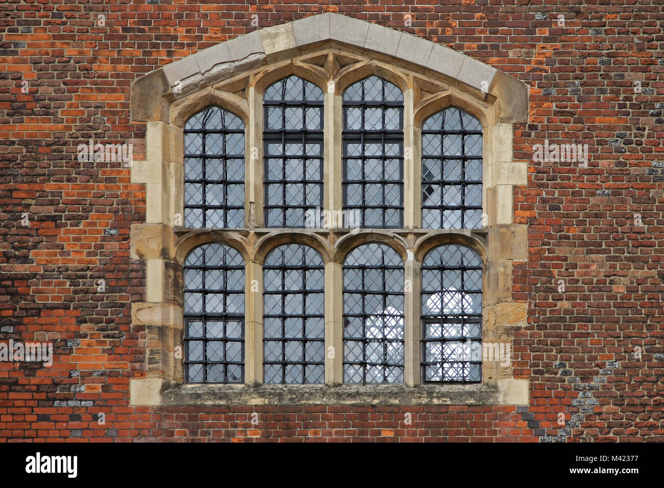 Detail of old brick wall building facade with large window Stock Photo ...
