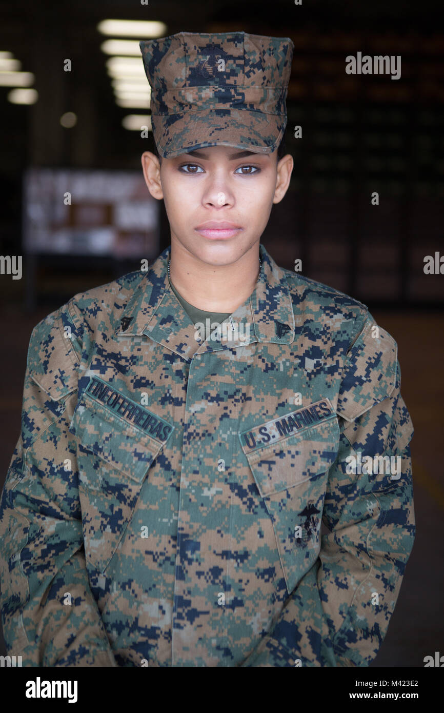 “I have been through a lot and had to push through it, but I never gave up trying to better myself. The key to my success is hard work, dedication and time management.”  - Cpl. Nelfi Tineoferreiras, the noncommissioned officer-in-charge of Receiving Section, Supply Company, Combat Logistics Regiment 35, 3rd Marine Logistics Group, was awarded III Marine Expeditionary Force’s Marine of the Year at Camp Kinser, Okinawa, Japan, Feb. 8, 2018. Tineoferreiras was honored with III MEF’s Marine of the Year for being exemplary in her duties, which included her technical proficiency and demonstration of Stock Photo