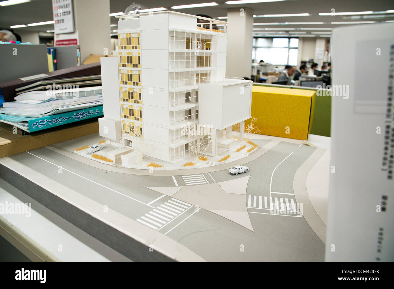 A small-scale model of a building for an architectural proposal, sits atop a cabinet, at Chuden Engineering Consultants’ facility in Hiroshima, Japan, Feb. 8, 2018. The Defense Policy Review Initiative (DPRI) scheduled a day with CEC to host their first American visitors, which included five Matthew C. Perry High School students, DPRI employees and a Matthew C. Perry teacher, for a tour of the building and to visit with their employees to see how they work. (U.S. Marine Corps photo by Sgt. Donato Maffin) Stock Photo