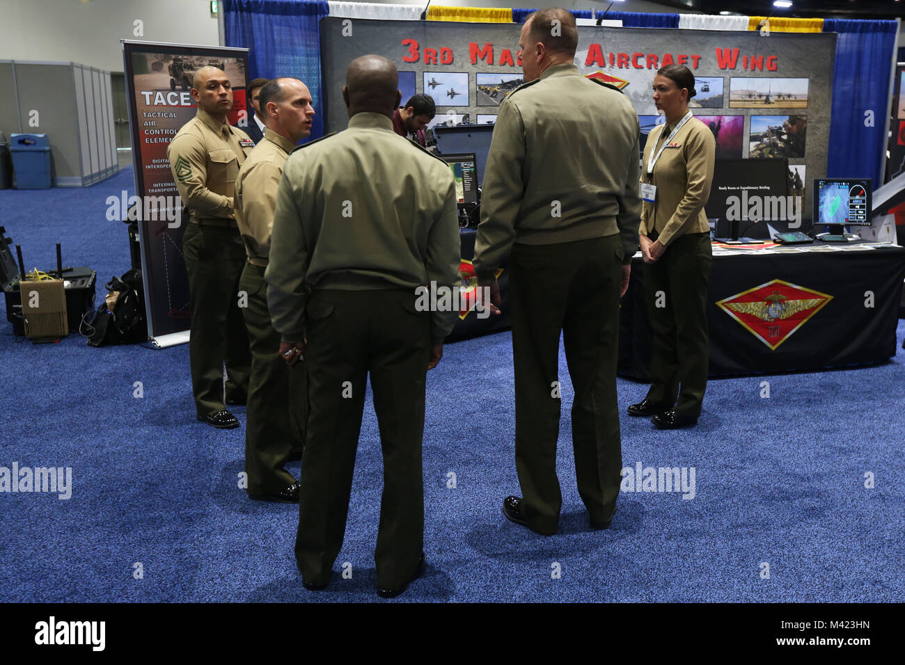 Maj. Gen. Mark R. Wise, 3rd Marine Aircraft Wing (MAW) commanding general, visits the 3rd MAW display at WEST 2018 in San Diego, Feb. 8. WEST 2018 allows innovators, industry leaders and the military the opportunity to network, learn and work together with the goal of meeting and overcoming challenges facing today's Sea Services. (U.S. Marine Corps photo by Sgt. David Bickel/Released) Stock Photo