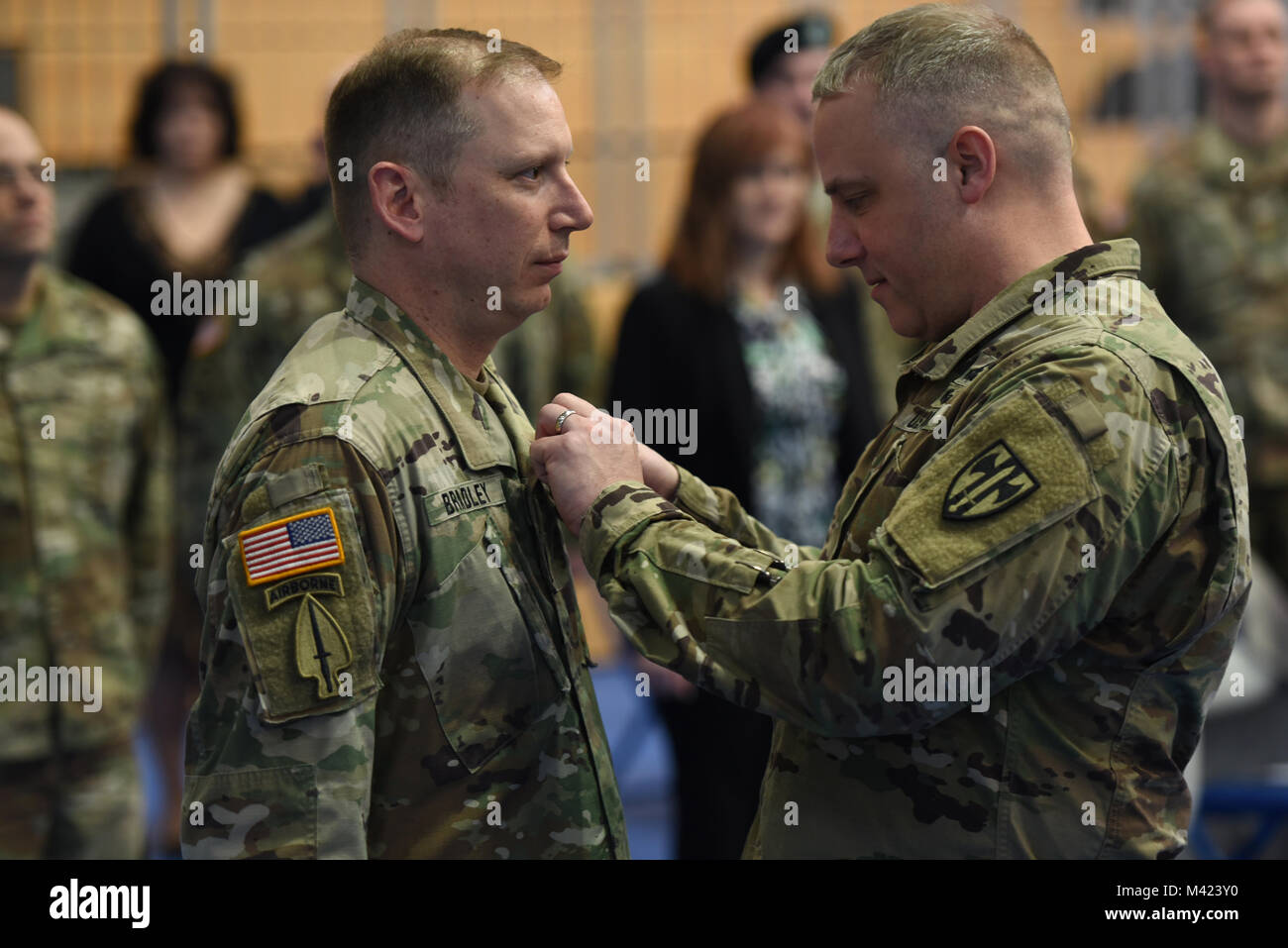 U.S. Army Command Sgt. Maj. Ethan Bradley, left, outgoing senior enlisted advisor of 709th Military Police (MP) Battalion (BN), 18th MP Brigade, receives a Meritorious Service Medal from Lt. Col. Jeffrey Searl, commander of 709th MP BN, during a change of responsibility ceremony at Tower Barracks, Grafenwoehr, Germany, Feb. 09, 2018.   (U.S. Army photo by Markus Rauchenberger) Stock Photo