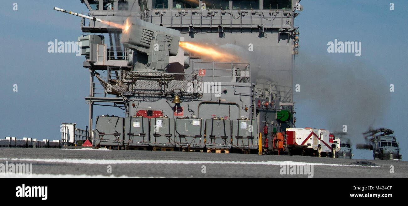 ATLANTIC OCEAN (Feb. 9, 2018) A rolling airframe missile is launched from the forward missile battery of the amphibious assault ship USS Iwo Jima (LHD 7) during a missile exercise. The Iwo Jima Amphibious Ready Group (ARG) is deployed in support of maritime security operations and theater security cooperation efforts in Europe and the Middle East. The Iwo Jima ARG embarks the 26th Marine Expeditionary Unit and includes Iwo Jima, the amphibious transport dock ship USS New York (LPD 21), the dock landing ship USS Oak Hill (LSD 51), Fleet Surgical Team 8, Helicopter Sea Combat Squadron 28, Tactic Stock Photo
