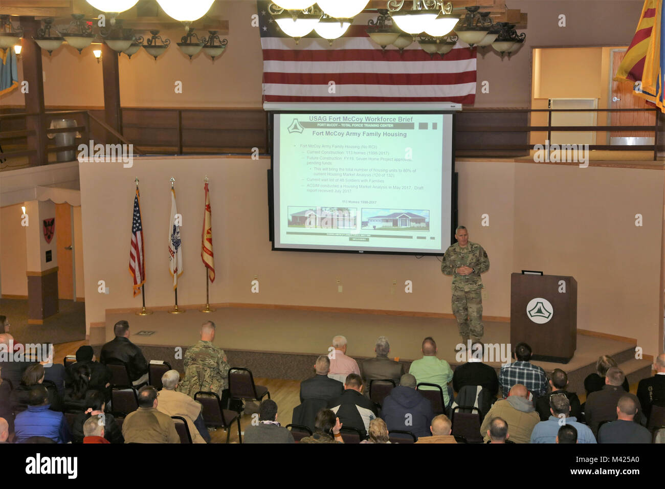 Garrison Commander Col. David J. Pinter Sr. provides his annual briefing to the Fort McCoy workforce Jan. 24, 2018, in building 905 at Fort McCoy, Wis. Pinter held two workforce briefings to hundreds of Fort McCoy employees where he discussed many plans, programs, and future efforts at the installation. (U.S. Army Photo by Scott T. Sturkol, Public Affairs Office, Fort McCoy, Wis.) Stock Photo