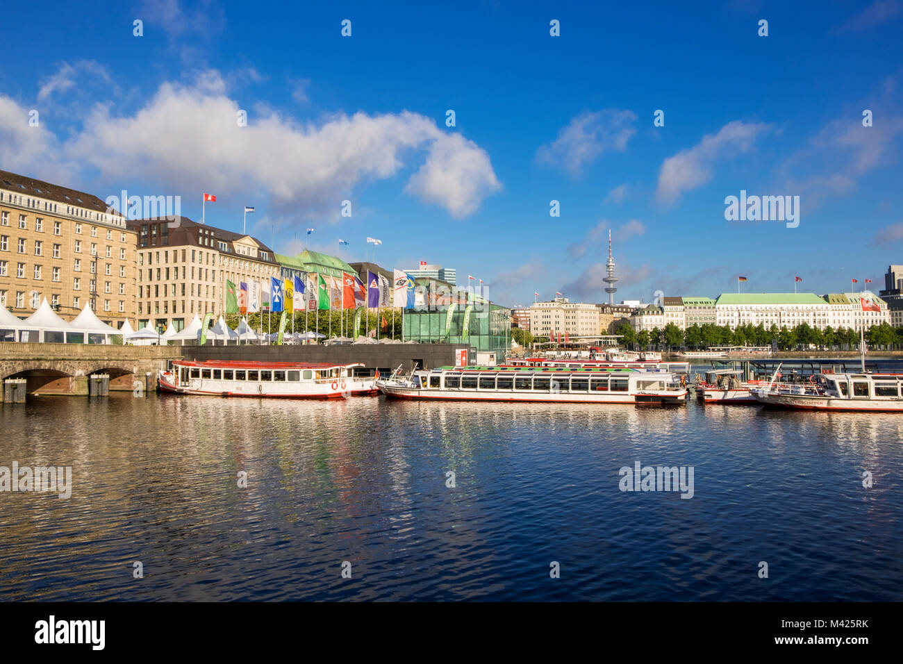 Alster Lake with pleasure cruise boats, in central Hamburg, Germany Stock Photo
