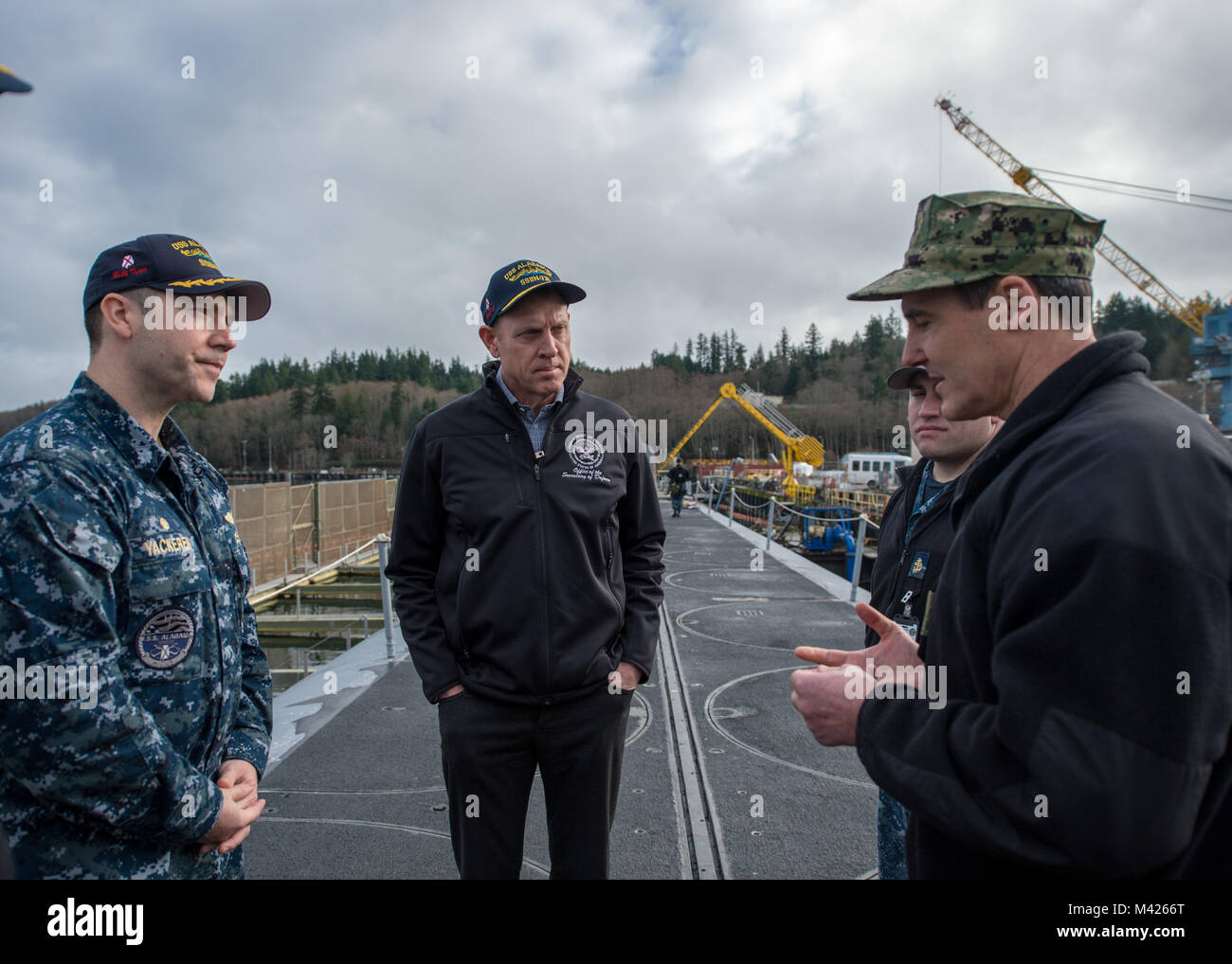 BANGOR, Wash. (Feb. 9, 2018) - Cmdr. Jeffery Yackeren, commanding officer Ohio-class ballistic missile submarine USS Alabama (SSBN 731), gives tour to Deputy Secretary of Defense Patrick Shanahan and facilities assigned to Commander Submarine Group 9 at Naval Base Kitsap-Bangor to see the operations of one leg of the nuclear triad. (U.S. Navy photo by Mass Communication Specialist 2nd Class Nancy C. diBenedetto/Released) Stock Photo