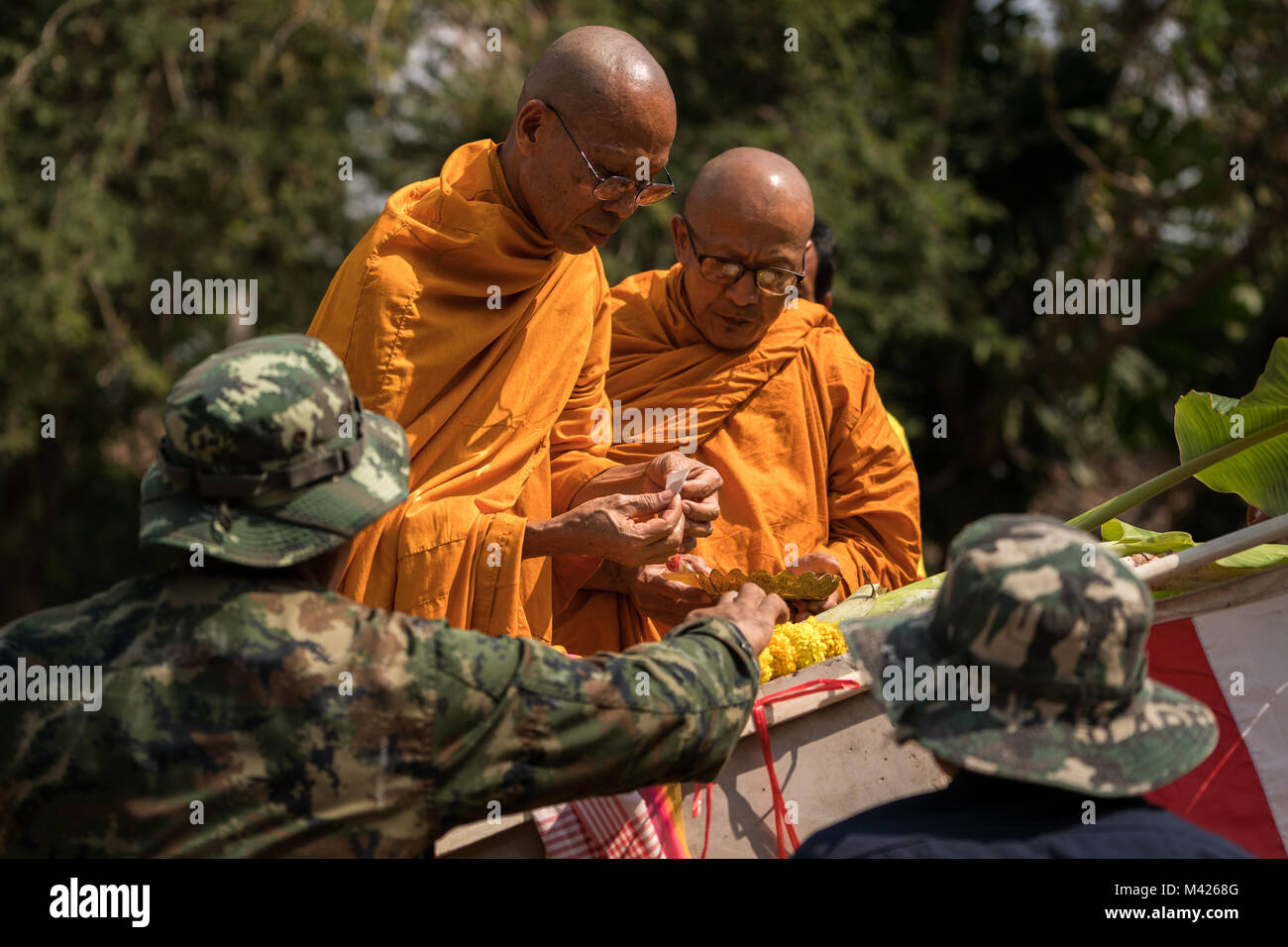 Buddhist monks bless the main pillar for a school building during a ceremony in support of Exercise Cobra Gold 2018 at Banthungsohongsa School in Chachoengsao, Kingdom of Thailand, Jan. 31, 2018. Humanitarian civic assistance projects conducted during the exercise support the needs and humanitarian interests of the Thai people. Cobra Gold 18 is an annual exercise conducted in the Kingdom of Thailand and runs from Feb. 13-23 with seven full participating nations. (U.S. Marine Corps photo by Sgt. Matthew J. Bragg) Stock Photo