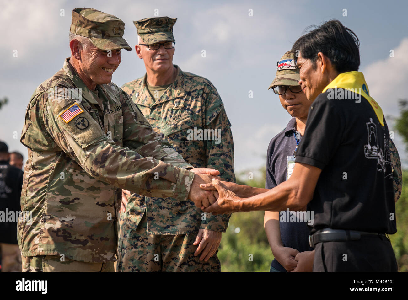 A Royal Thai Marine handles a cobra during the jungle survival class at Cob...