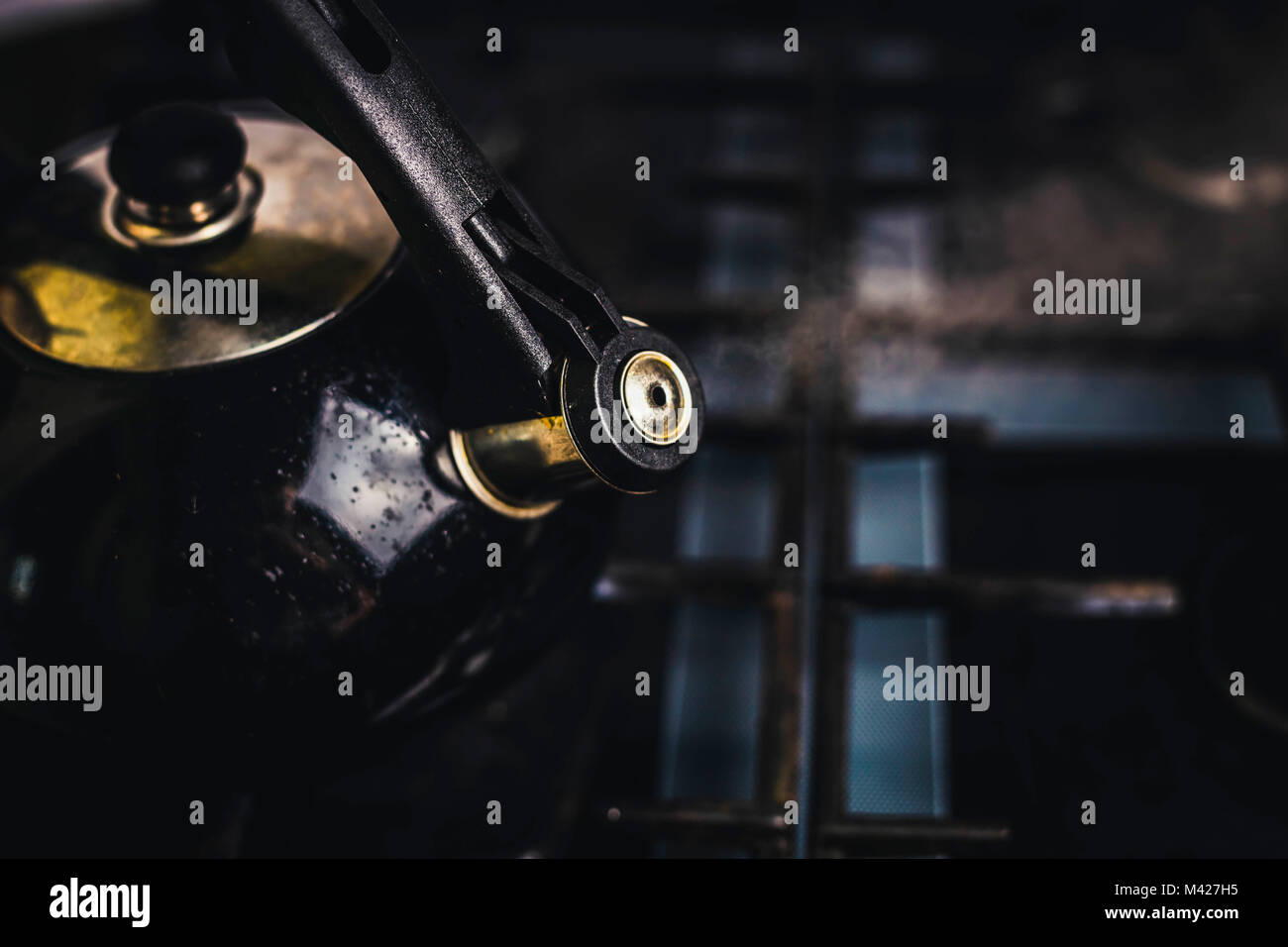 dirty boiling kettle on the stove Stock Photo Alamy