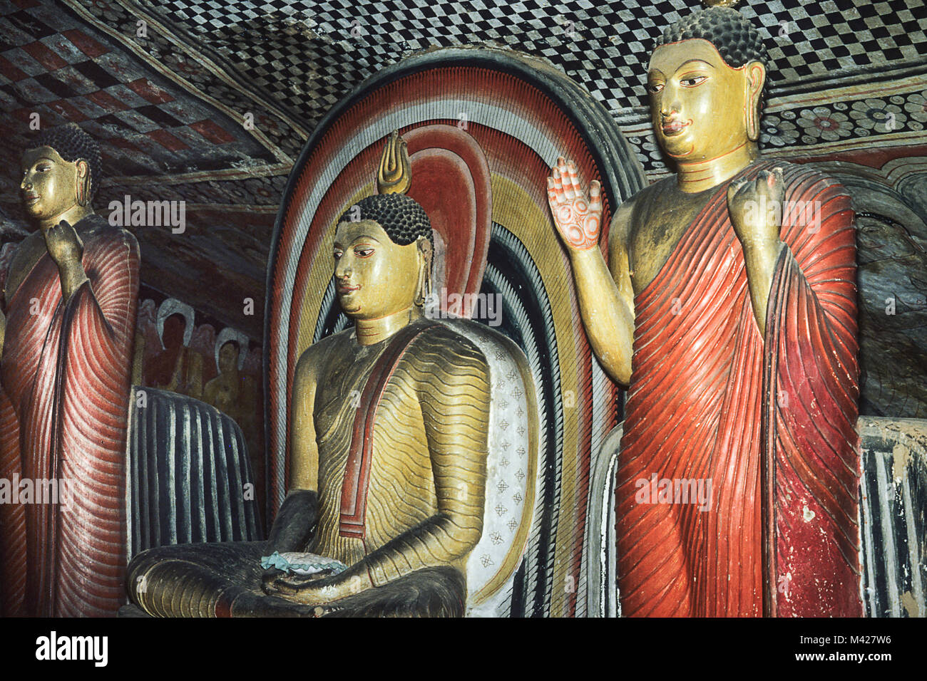 Statue of Buddha inside of caves in ancient Buddhist complex in Dambulla cave temple, Dambulla, Sri Lanka Stock Photo