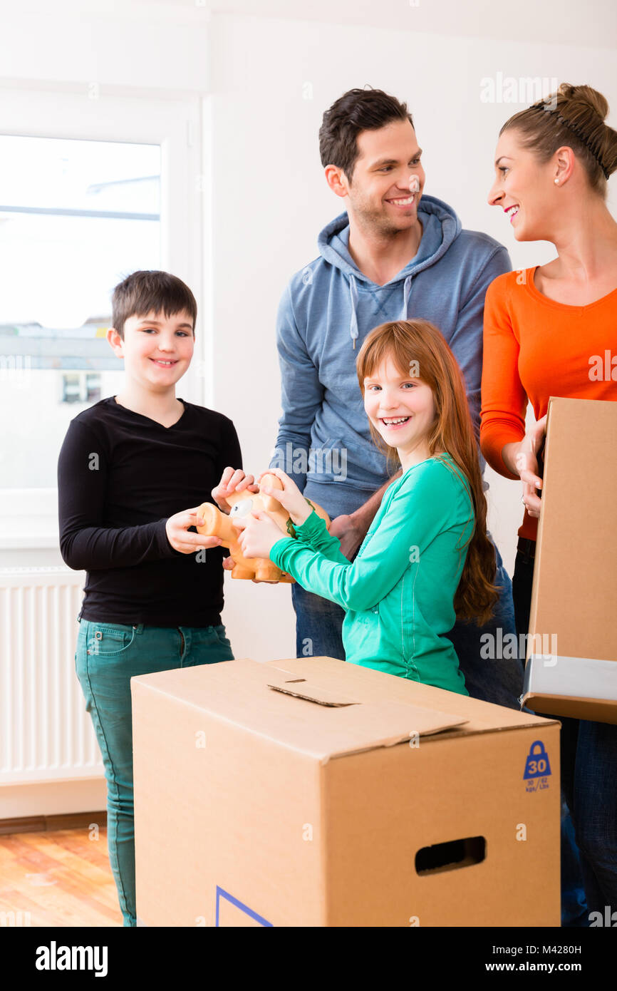 Family moving into new home Stock Photo