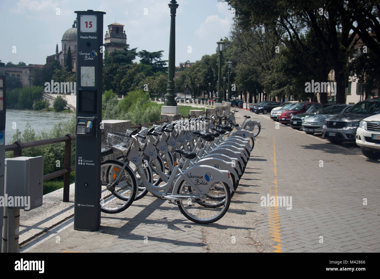 A row of cycles at a Verona Bike station, Verona Italy. Stock Photo