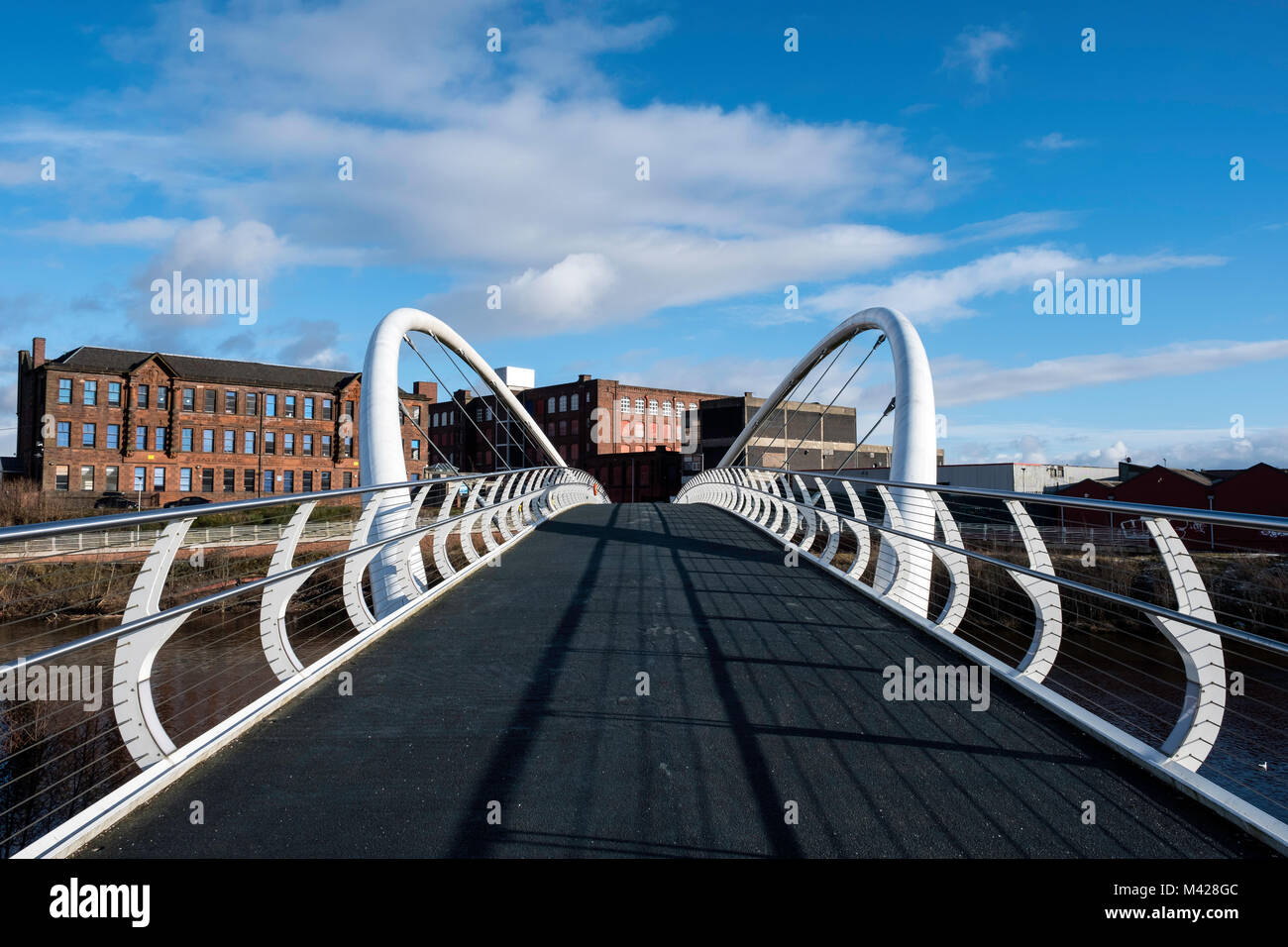 View of modern Clyde Gateway Bridge  crossing River Clyde at Shawfield in East End of Glasgow, Scotland, United Kingdom Stock Photo