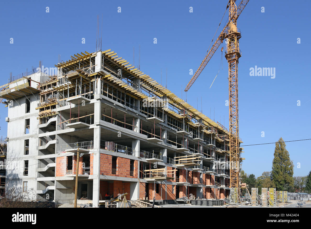 new building construction site with crane Stock Photo Alamy