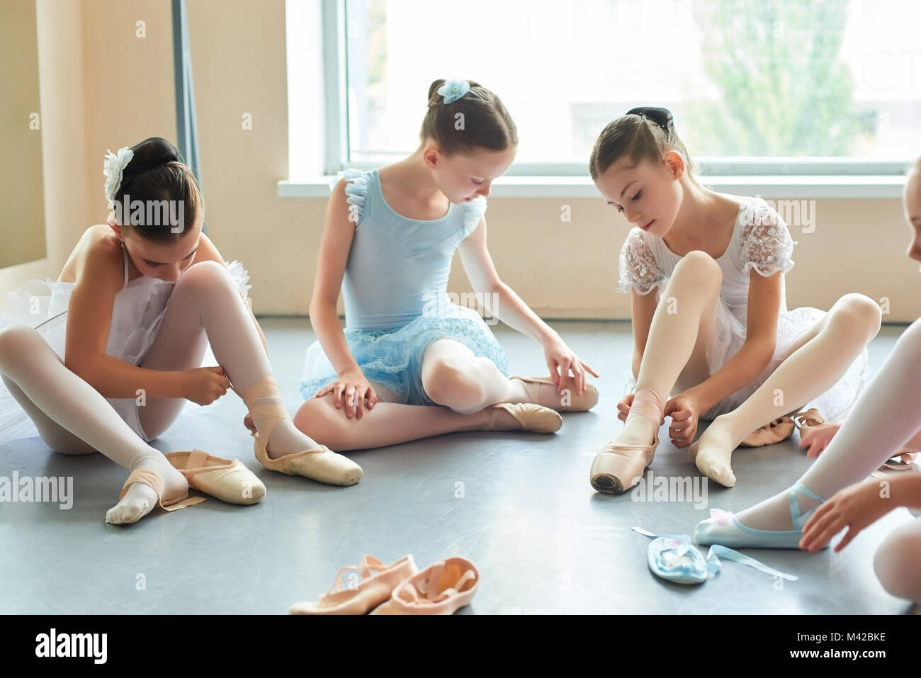 Female ballet dancers sitting on hires stock photography and images