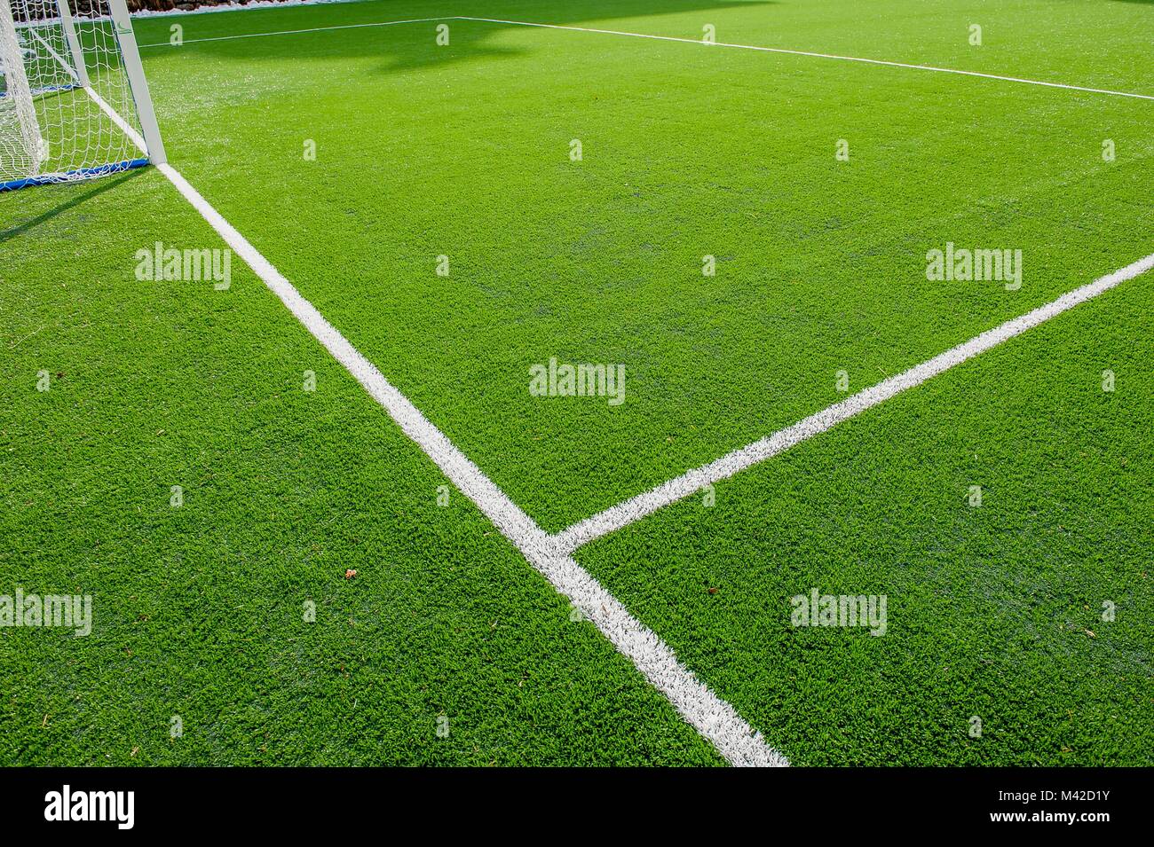 corner in the football field with artificial turf flag Stock Photo Alamy