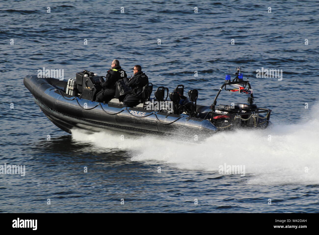 A Ministry of Defence Police RHIB providing escort and surveillance duties on the Clyde during Exercise Joint Warrior 17-2. Stock Photo