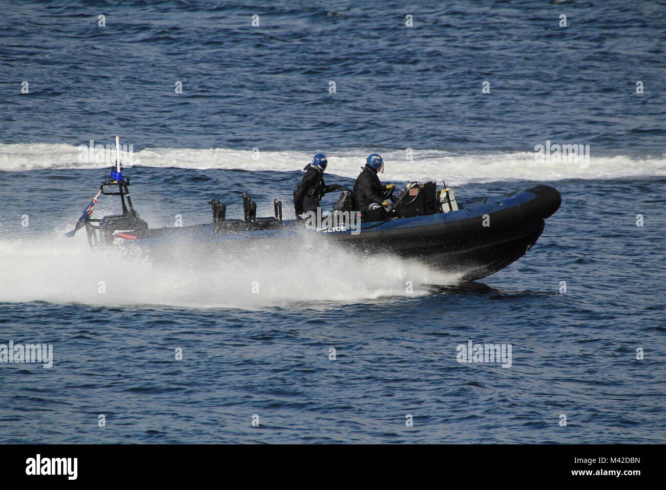 A Ministry of Defence Police RHIB providing escort and surveillance duties on the Clyde during Exercise Joint Warrior 17-2. Stock Photo
