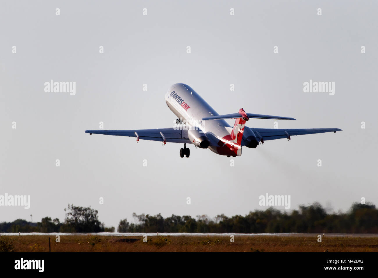 Qantas link passenger aircraft taking off at Broome airport,  Broome, West Kimberley, Western Australia Stock Photo