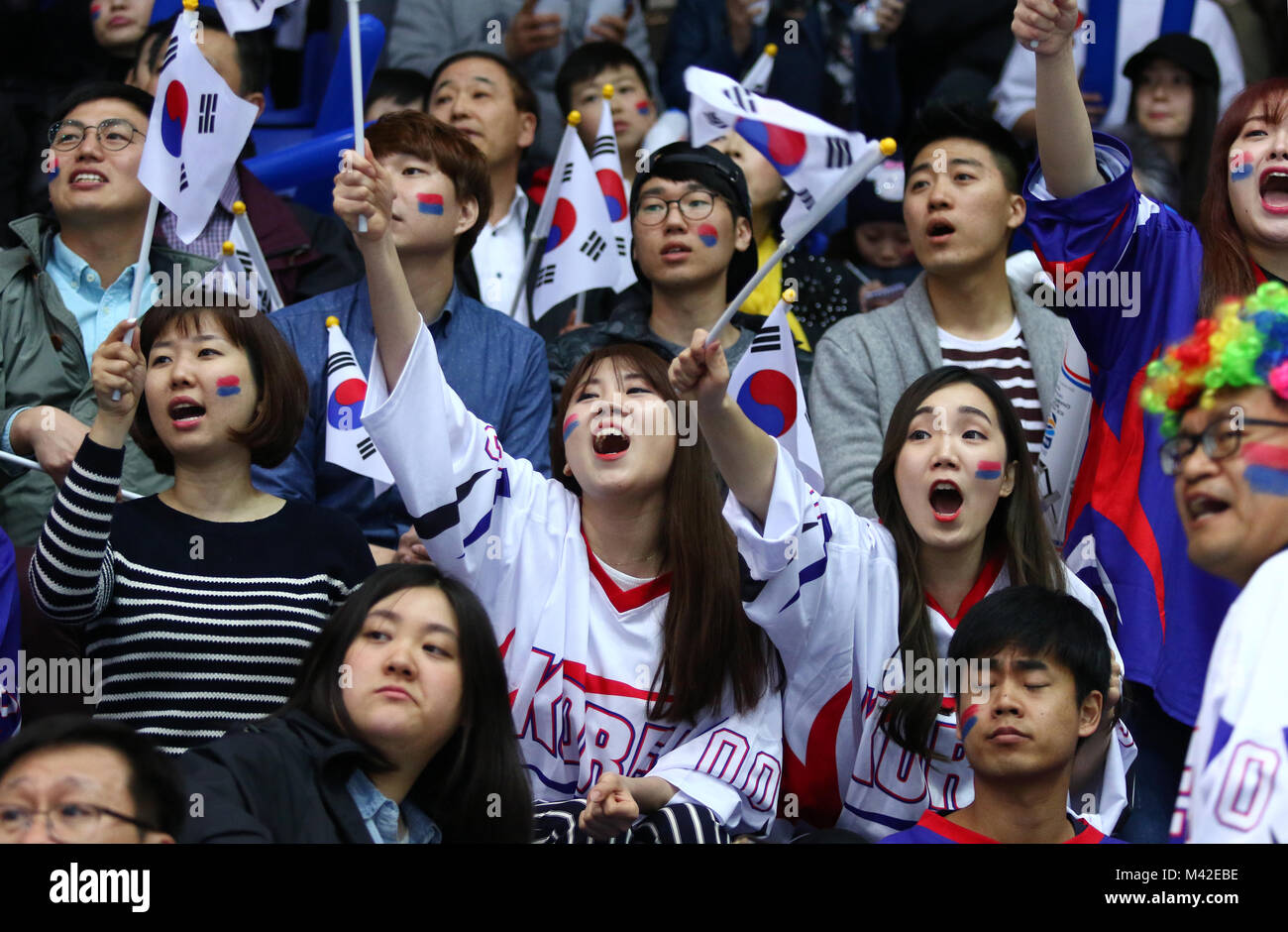 KYIV, UKRAINE - APRIL 28, 2017: South Korean fans show their support during IIHF 2017 Ice Hockey World Championship Div 1 Group A game against Ukraine Stock Photo