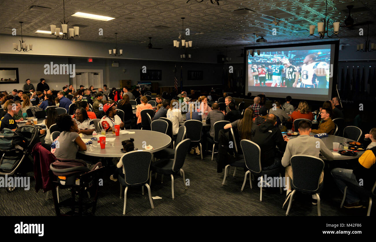 Members of Team BLAZE watch the Super Bowl LII coin flip Feb. 4, 2018 ...