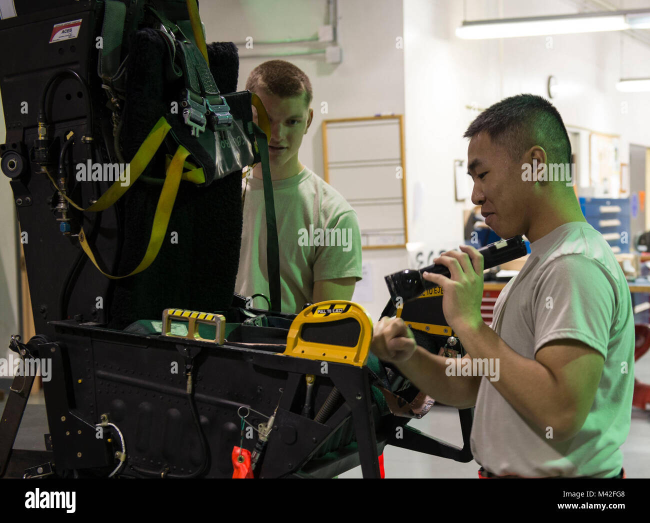 Airmen from the 18th Component Maintenance Squadron egress shop perform ...