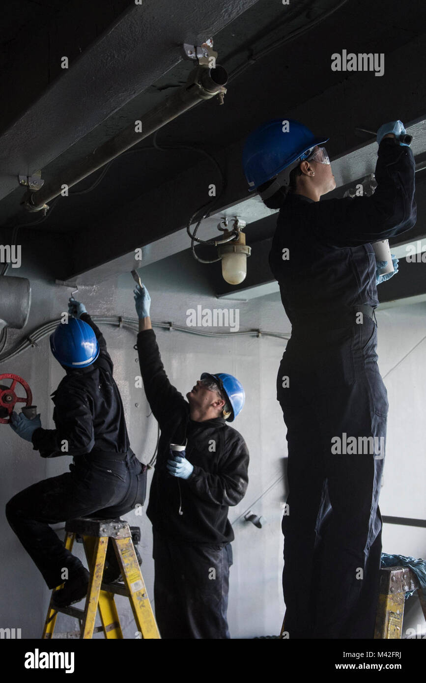 Yokosuka Japan Feb 8 18 Sailors Paint An Angle Iron On A Stock Photo Alamy