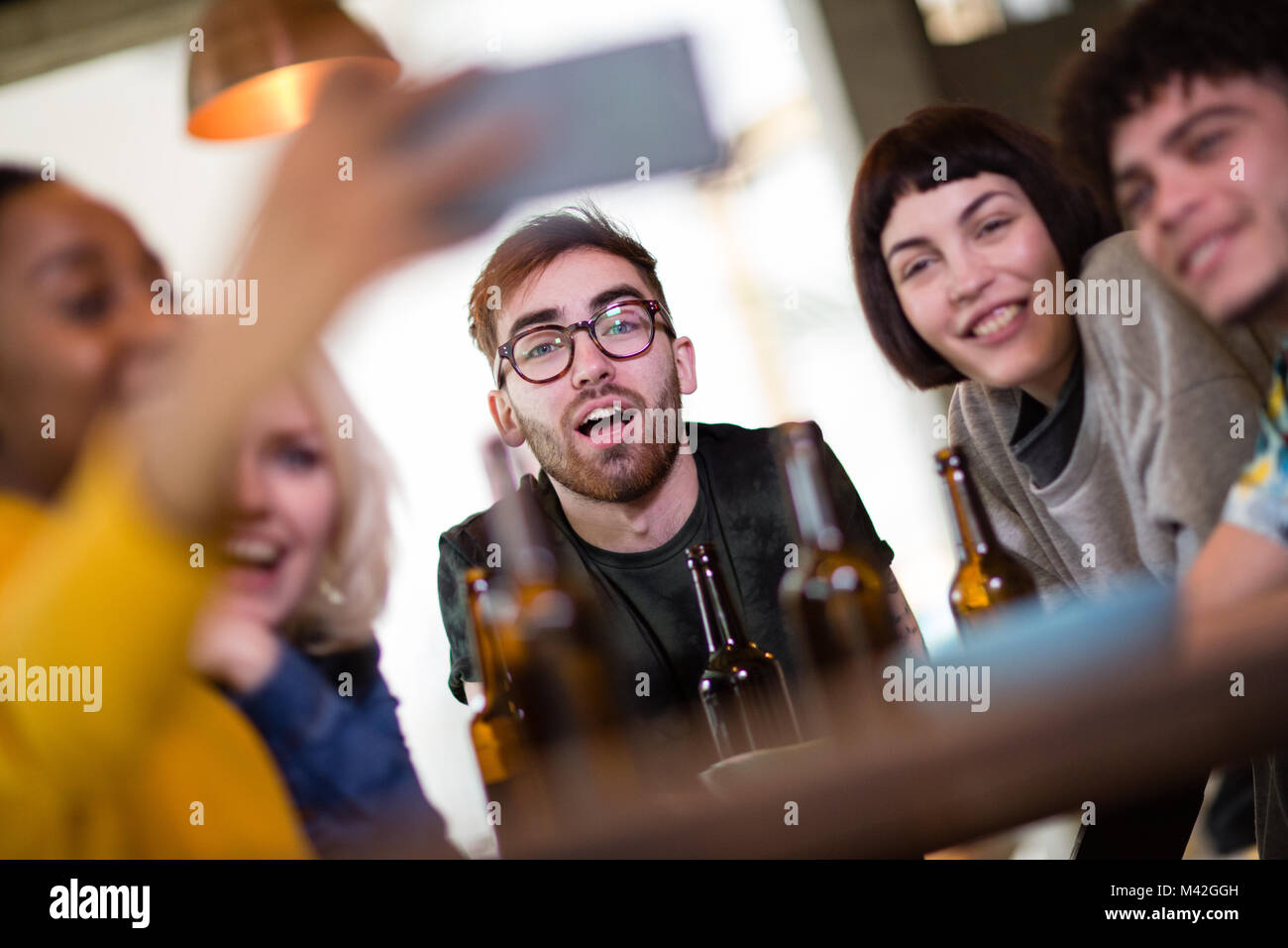 Group of friends posing for a group selfie Stock Photo