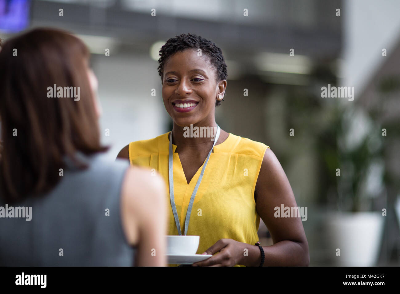 Female business executives meeting at a networking event Stock Photo