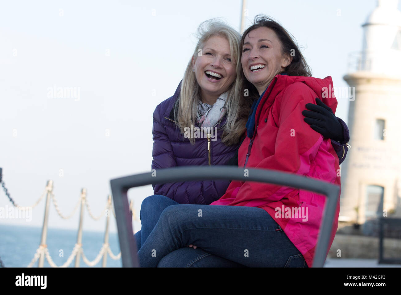 Mature female friends enjoying the outdoors in winter Stock Photo