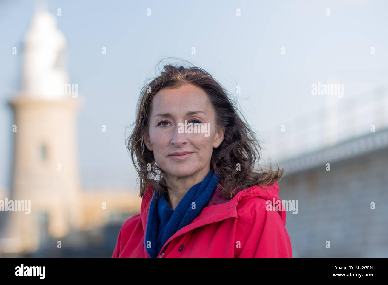 Portrait of mature female enjoying the outdoors in winter Stock Photo