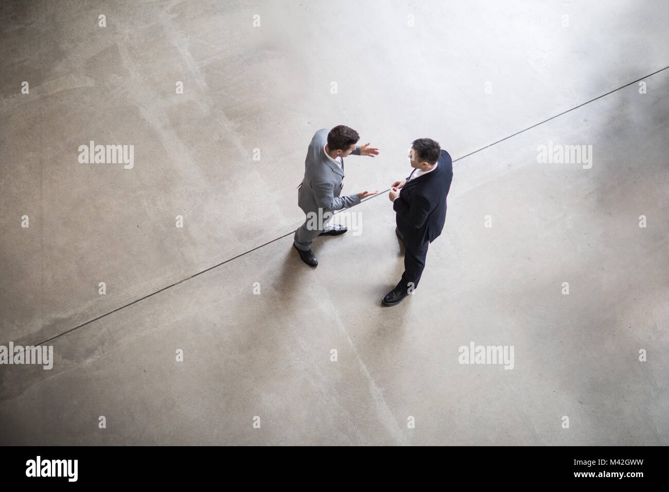 Overhead shot of two businessmen in a meeting Stock Photo Alamy