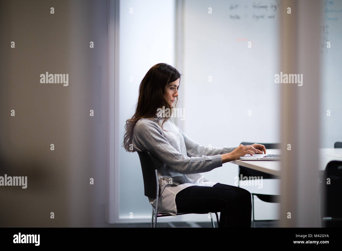 Businesswoman working on a presentation Stock Photo