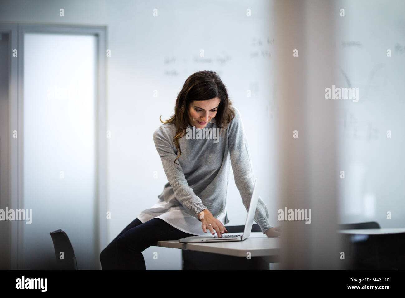 Businesswoman working on a presentation Stock Photo
