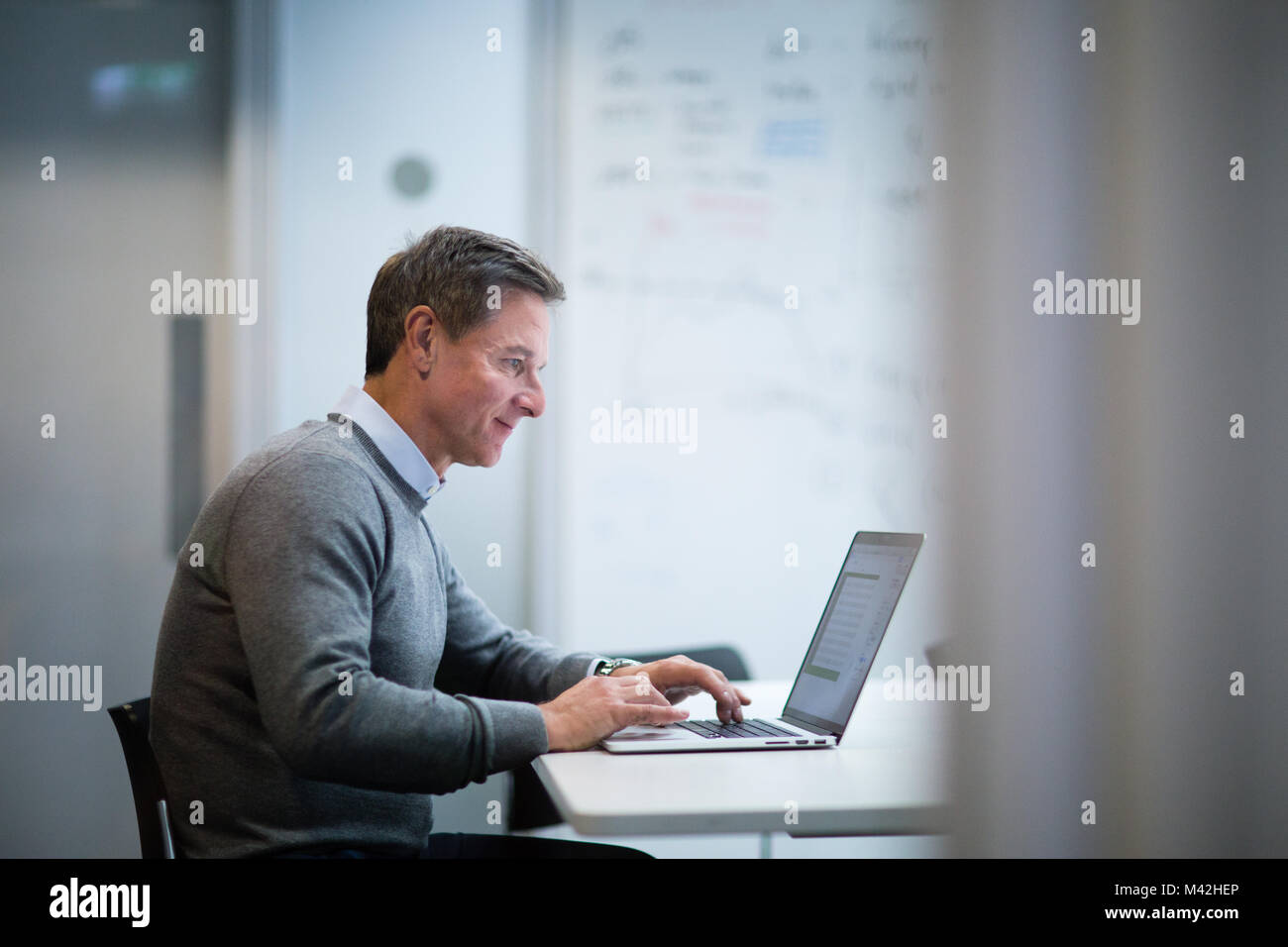 Businessman working on a presentation Stock Photo