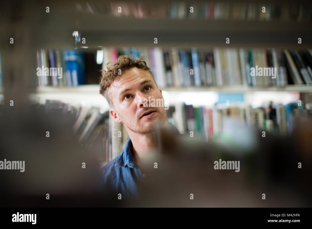 Adult student in library Stock Photo